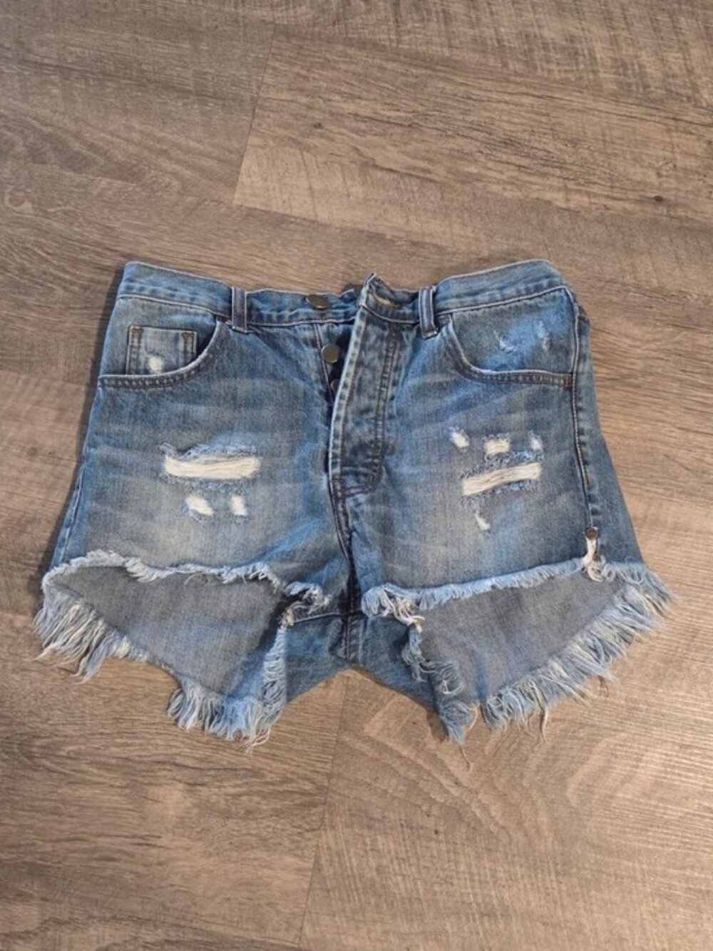One Teaspoon Outlaws Distressed Denim Shorts.